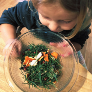 Looking into a bowl of dried ingredients for winter potpourri